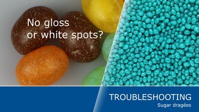 Como prevenir superficies opacas, falta de brillo y puntos blancos en grageados de azúcar